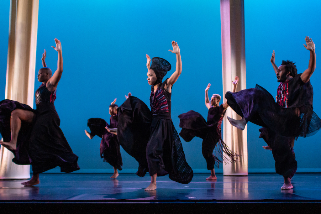 Group of Black dancers from the EVIDENCE, A Dance Company performing on stage.